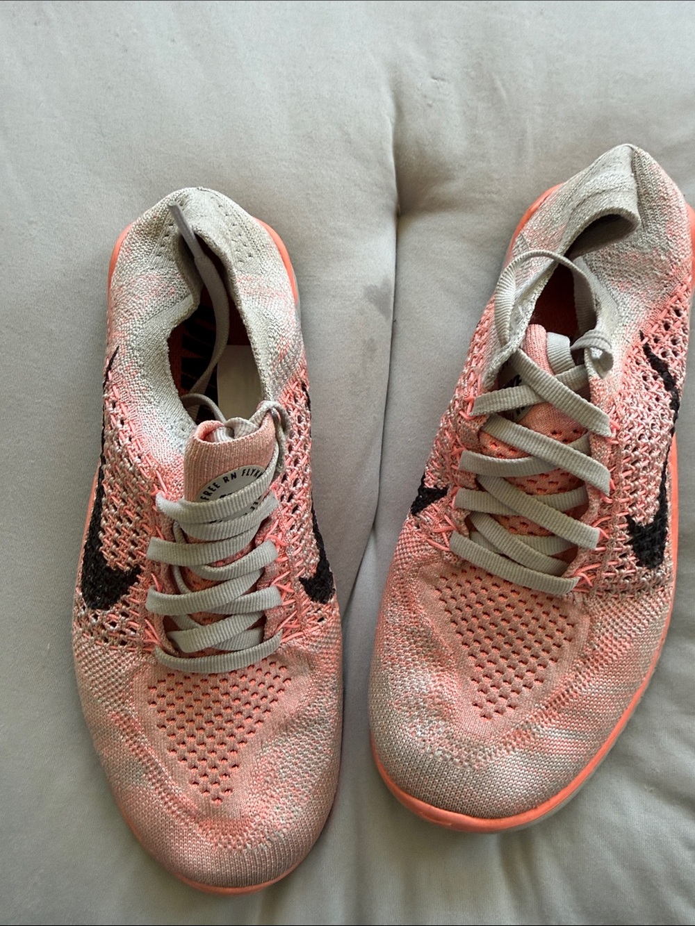 Nike Flyknit Women's Running Shoes in Coral and Black